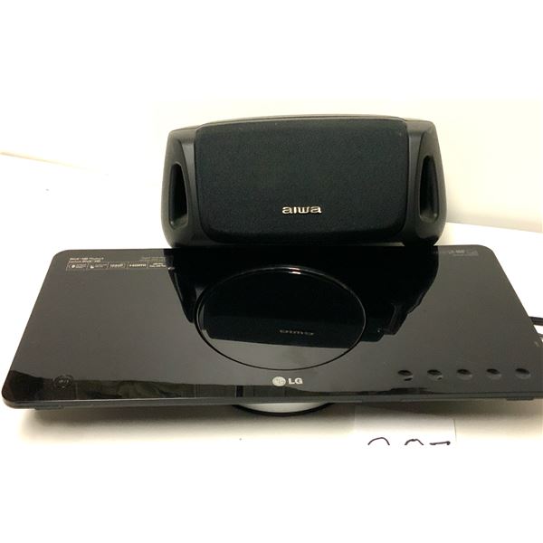 LG DVS450H DVD player. This stylish DVD player can be set up horizontally, vertically, or mounted on