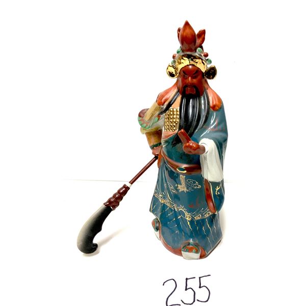 13 inch porcelain statue of Guan Yu, Chinese God of War and Wealth, depicted with guan dao weapon.