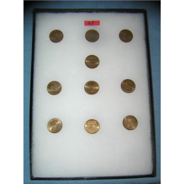 Collection of solid brass US state commemoratives