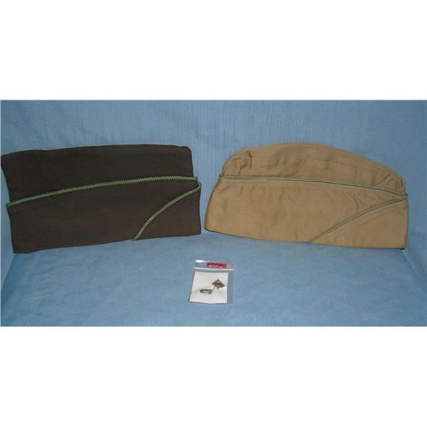 Pair of U.S. military overseas caps and a U.S. tank armored division badge