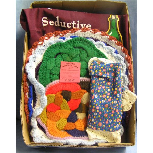 Two aprons and five knitted doilies