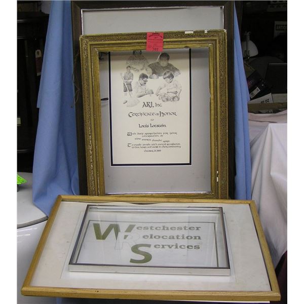 Group of four antique and modern frames