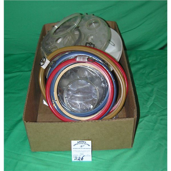 Box full of knitting and crocheting accessories