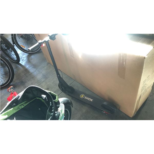 2 SHOK KID SCOOTERS WITH A CHARGER