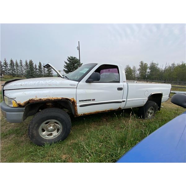 White Dodge reg cab 4 by 4 sold for parts