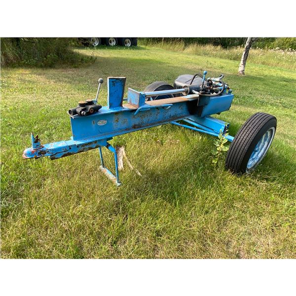 Blue wood splitter, mtd on single axle, sold as is