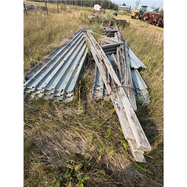 Lot of Rafters & metal clad Approx 20 sheets selling by the pile and approx. 20 ft long