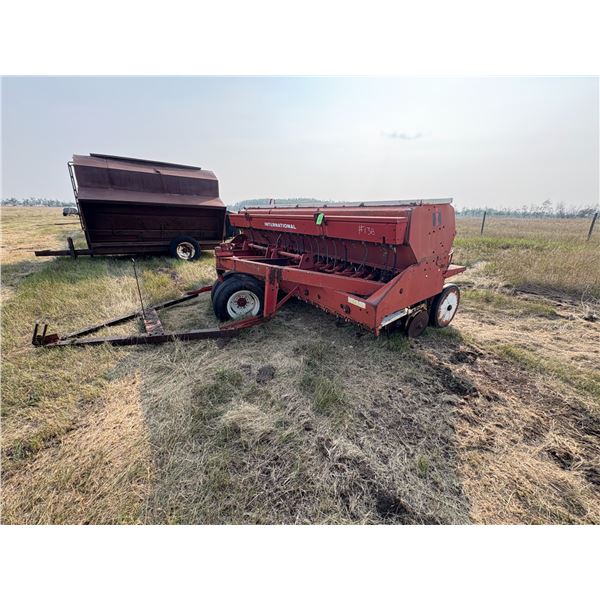 I.H 620 Press drill c/w grass attach.