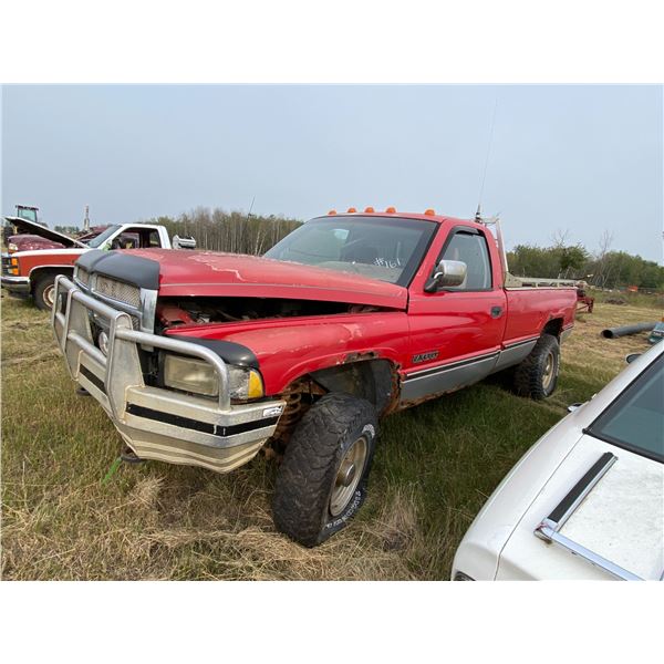 1994 Red reg cab Dodge 2500 4 by 4 diesel serial #1B7KF26C1RS585354, sold as is