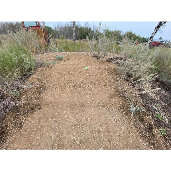 2 piles of gravel approx. 40 yds sold by the piles Buyer responsible to load