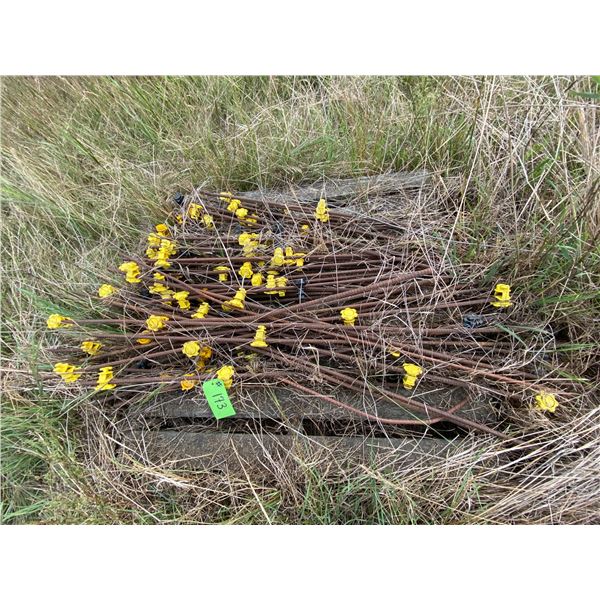 Electric fence rebar pegs sold by the pile