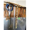 Image 1 : Levels, Bolt Cutter, Meat Saw, T-Square plus misc. Tools hanging on the Peg Board, Plus Clamps & Pos
