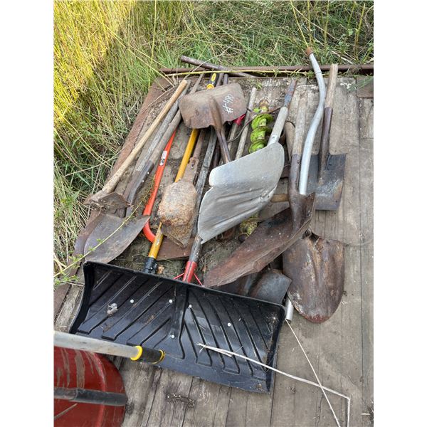 Barrel Full and Pallet Full of Shovels, Hockey Sticks, Saws, etc.