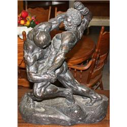 Statue of Men Fighting