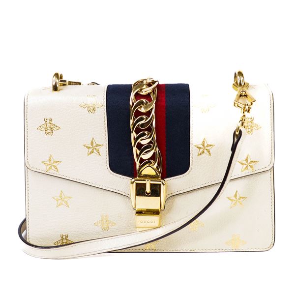 Gucci Sylvie Leather Shoulder Bag â€“ Ivory with Gold Bee & Star Motif