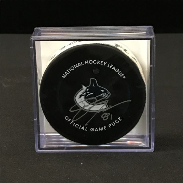 DAKOTA JOSHUA SIGNED GAME USED CANUCKS PUCK CANUCKS COA