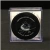 Image 1 : DAKOTA JOSHUA SIGNED GAME USED CANUCKS PUCK CANUCKS COA