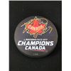 Image 1 : NATHAN MCKINNON SIGNED 4 NATIONS HOCKEY PUCK GCG HOLO