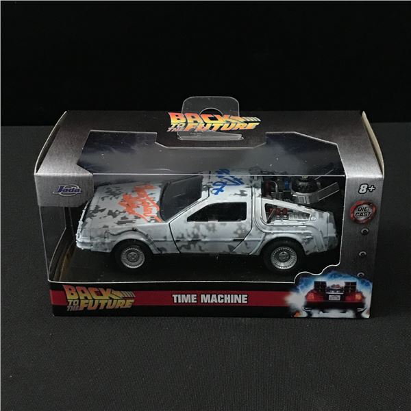 MICHAEL J FOX AND CHRISTOPHER LLOYD SIGNED DIE CAST BACK TO THE FUTURE CAR WWOC COA