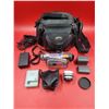 Image 1 : Camera & Accessory Lot w/ Canon ZR80 Camcorder, Carrying Case, Konika Fish Eye Lens, & More