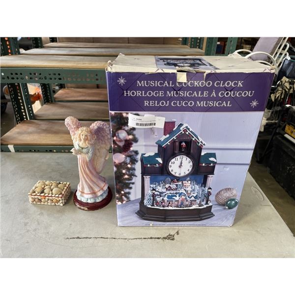 MUSICAL CUCKOO CLOCK AND ANGEL FIGURE, SHELL BOX