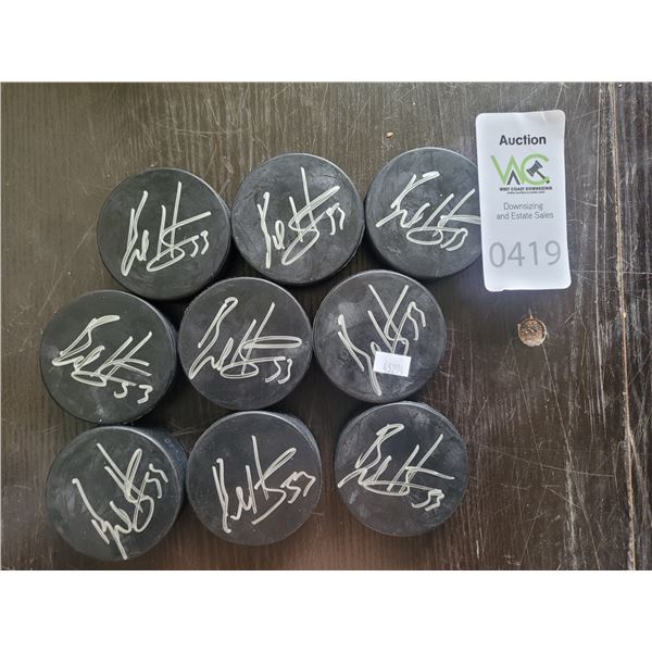 Signed Hockey Pucks by Bo Horvat A