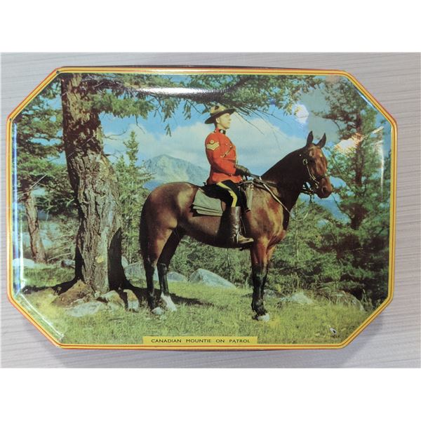 VINTAGE CANADIAN MOUNTIE ON PATROL TIN