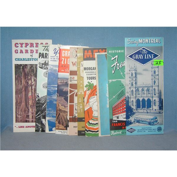 Group of vintage travel maps and brochures
