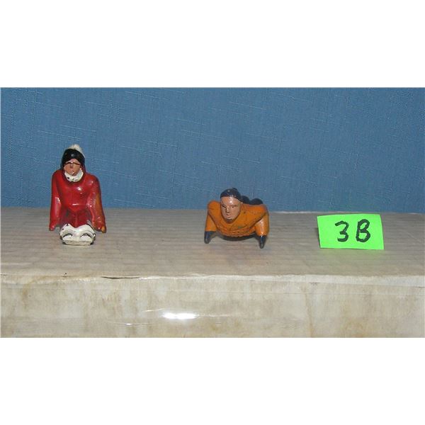 Pair of vintage winter scene figures