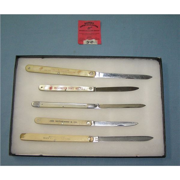 Early celluloid and stainless steel advertising fruit knives