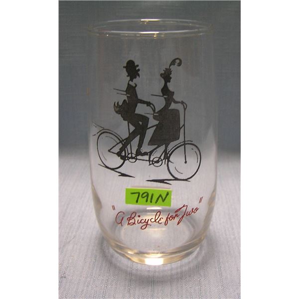 Early bicycle themed drinking glass