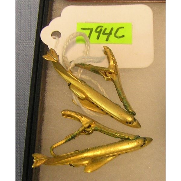 Early gold toned airline/aviation tie clasps