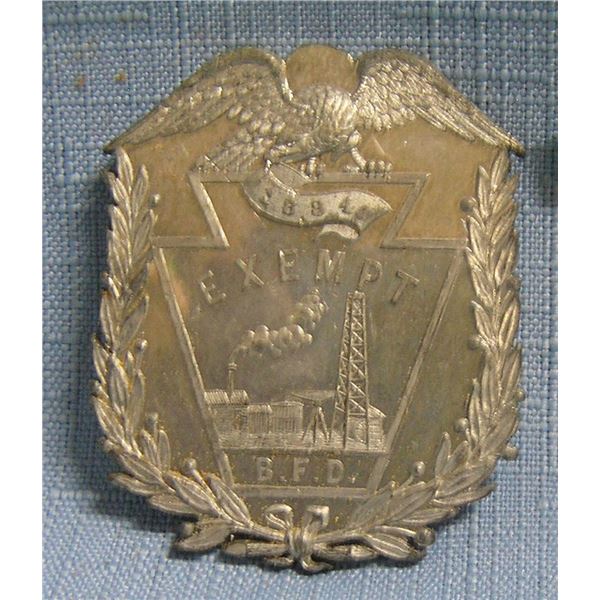 Antique firemans exempt shield dated 1884
