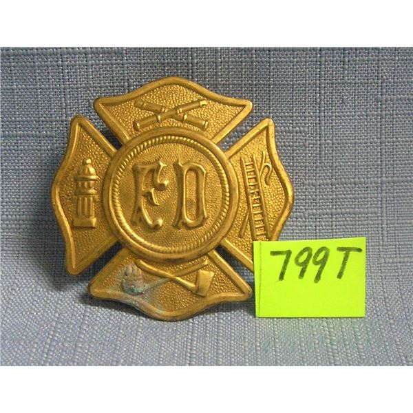 Antique F.D. hat badge