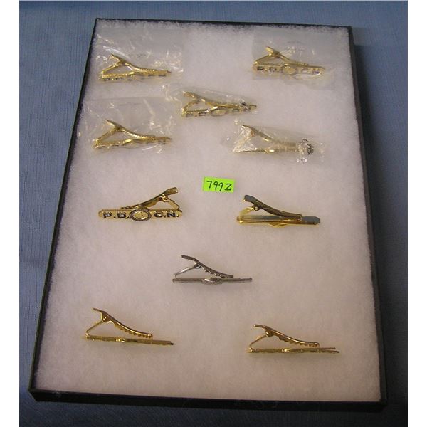 Collection of vintage policeman tie clips