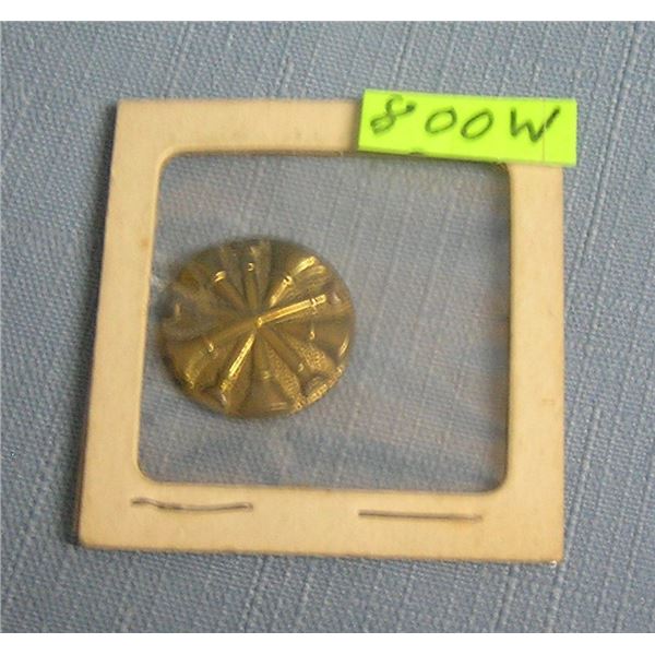 Early Brass fire trumpet shield