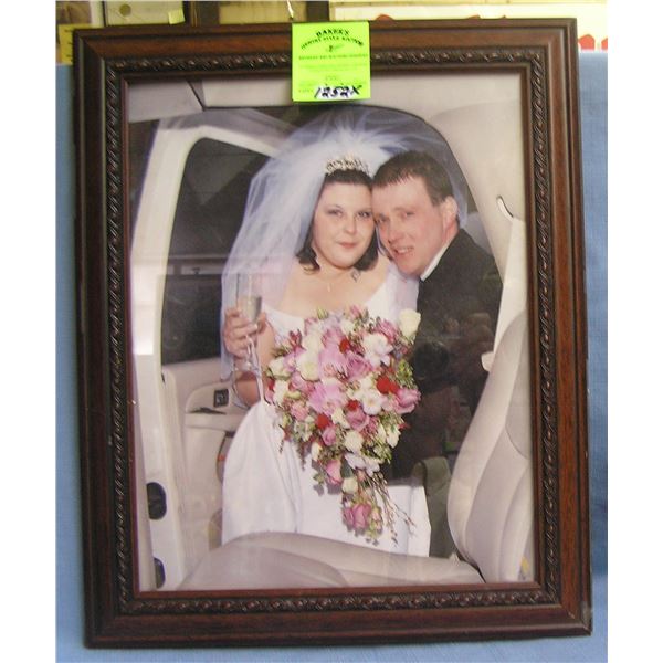 Modern wedding photo in mahogany frame