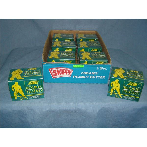 Box full of Score hockey rookie and traded card sets