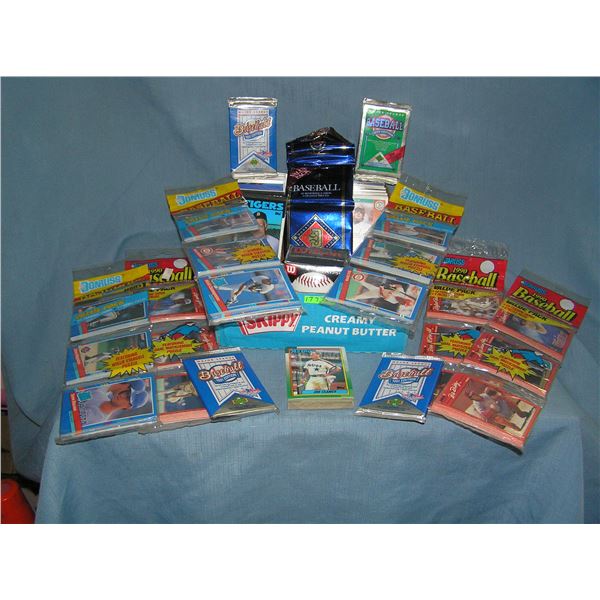 Box full of factory sealed and some opened baseball cards