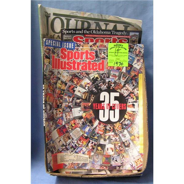 Box of vintage sports collectibles