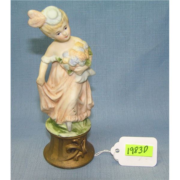 Hand painted porcelain flower girl figurine