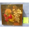 Large fruit decorated Lucite paperweight