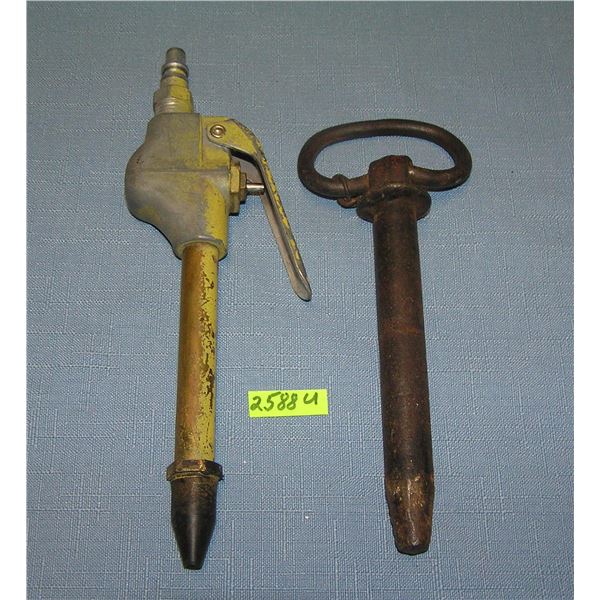 Milton air nozzle and an antique iron push pin