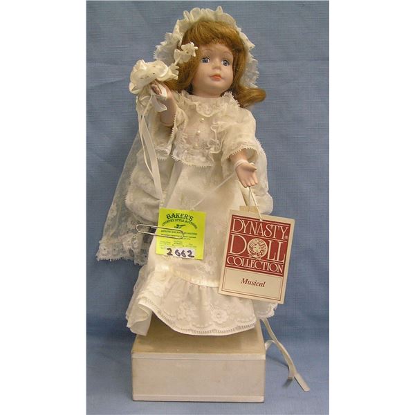 Vintage porcelain musical bride doll