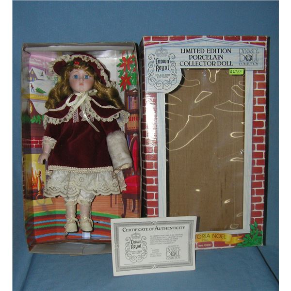 Porcelain doll with beatuful maroon dress and hat