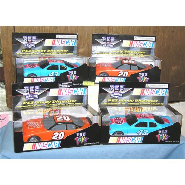 Collection of vintage NASCAR candy dispensers