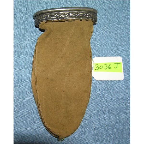 Antique purse with silver plate trim and opening