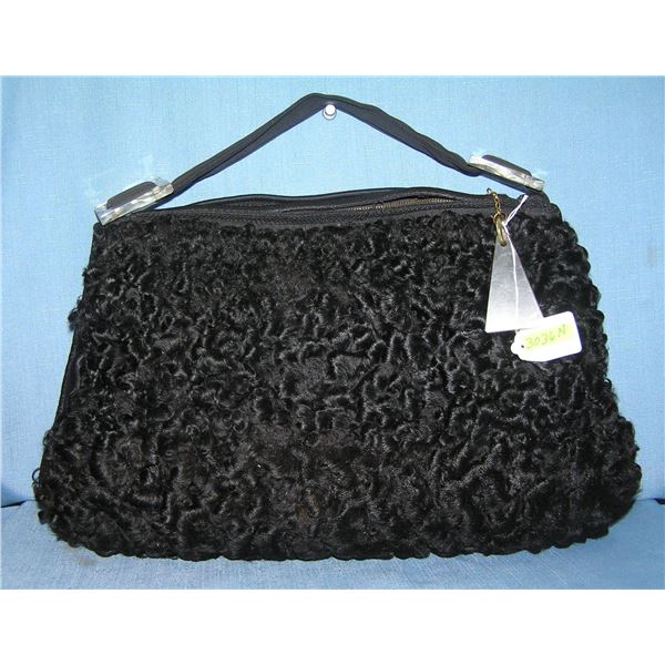 Lamb's wool pocket book with clear lucite strap