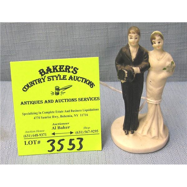 Vintage bisque bride and groom figurine