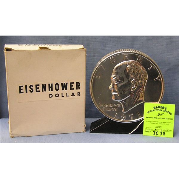 Vintage cast metal Eisenhower dollar coin bank